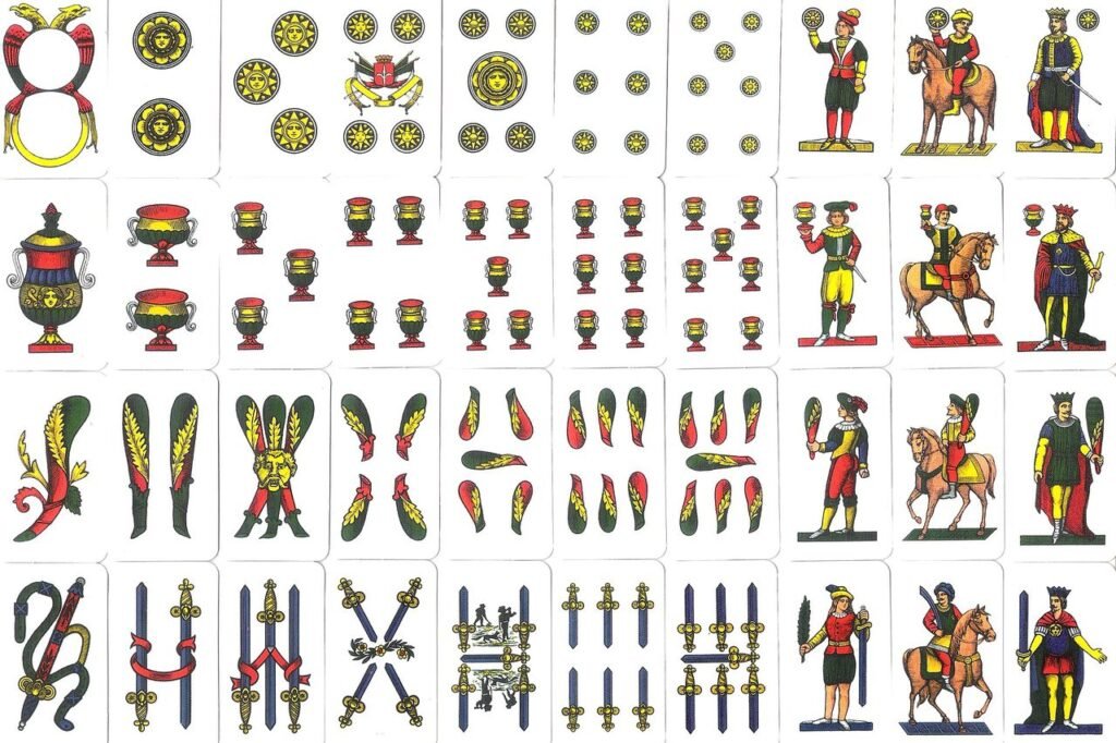 Mazzo completo di carte napoletane disposto sui quattro semi